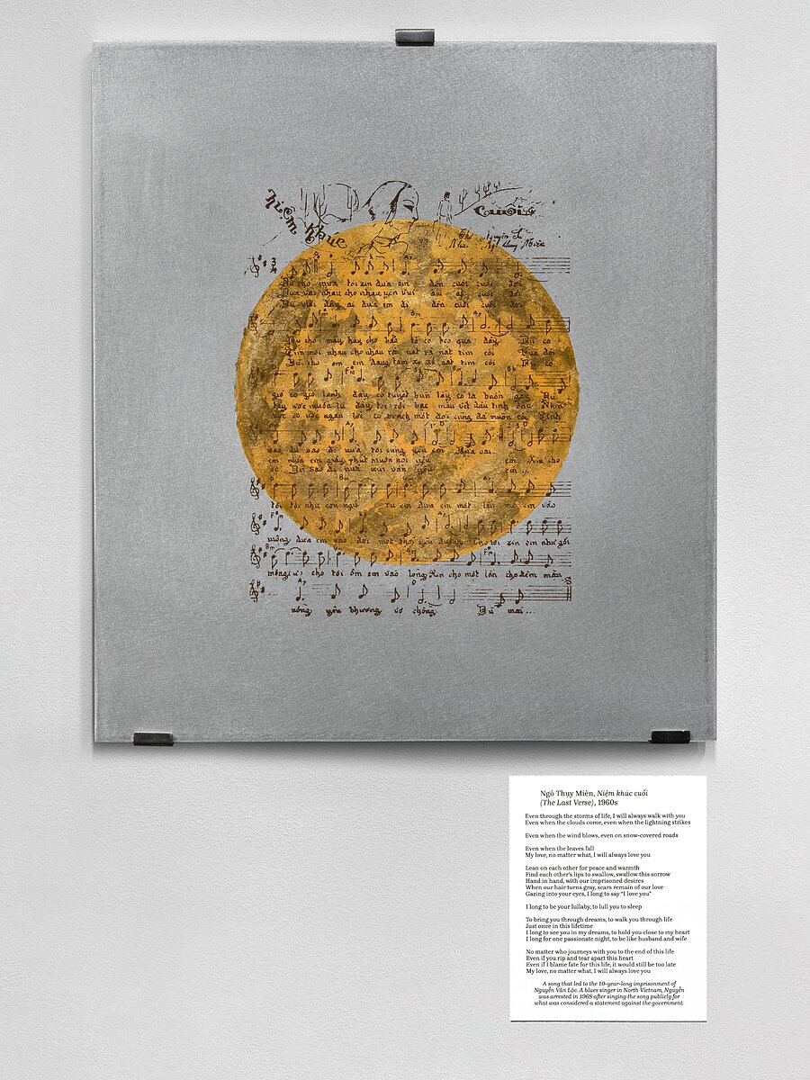 A square canvas with a silver background and a golden circle in the center with text and musical store printed on top.