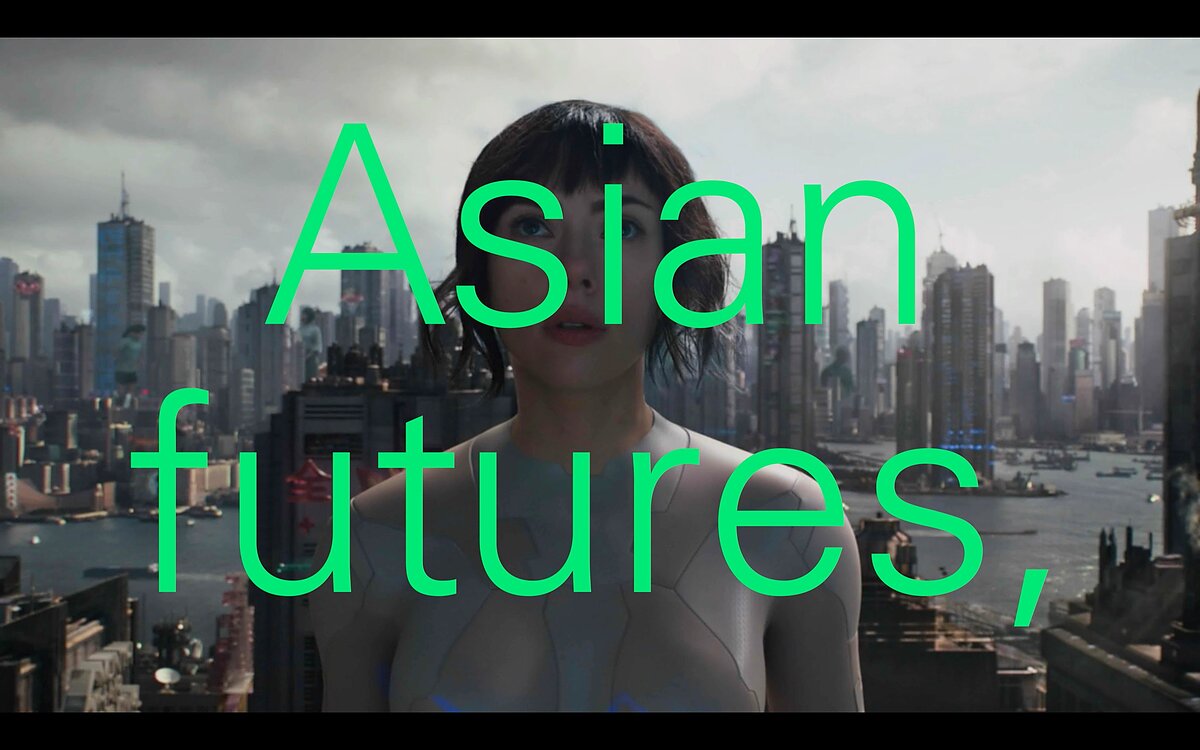 A still from the film "Ghost in the Shell" featuring Scarlett Johannson with the words "Asian futures," superimposed in bright green font.