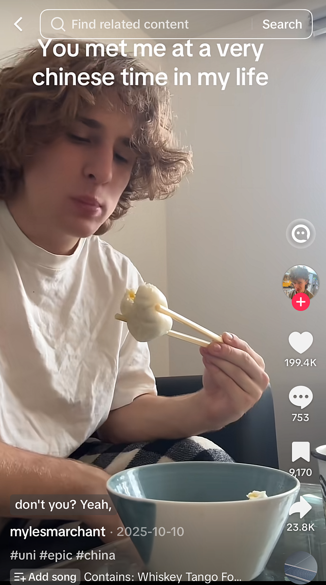 A TikTok screenshot of a young, non-Chinese person eating a dumpling with the words "You met me at a very chinese time in my life."